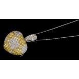 White and yellow metal diamond heart-shape pendant of bombe form, with chequered design,