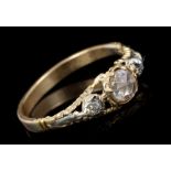 Mid-18th century-style diamond ring with a central rose cut diamond flanked by two old cut diamonds