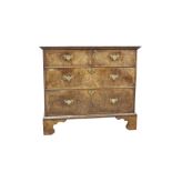 Good early 18th century walnut crossbanded chest of drawers with projecting top and two short over