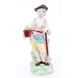 18th century Derby porcelain figure of a gardener holding a spade and plant in pot - incised marks