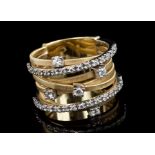 Marco Bicego gold and diamond band ring with seven interwoven bands with brilliant cut diamonds and