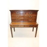 19th century mahogany cabinet on stand with crossbanded moulded top above faux drawer,