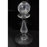 19th century glass lacemakers' oil lamp with facet cut bowl and stem on broad splayed foot,