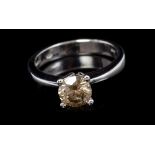 White gold (18ct) champagne-coloured diamond single stone ring with a brilliant cut diamond