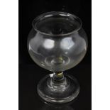 Early 19th century lacemakers' glass magnifying bowl on plain stem and thick foot,