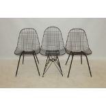 Pair of Eames design DKR steel wire dining chairs with lattice seat on wire supports,