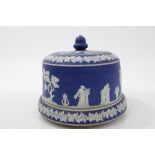 Three Victorian Wedgwood-style blue Jasper ware stilton domes and bases with classical figure