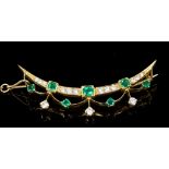 Victorian-style emerald and diamond crescent brooch with round mixed cut emeralds and brilliant cut