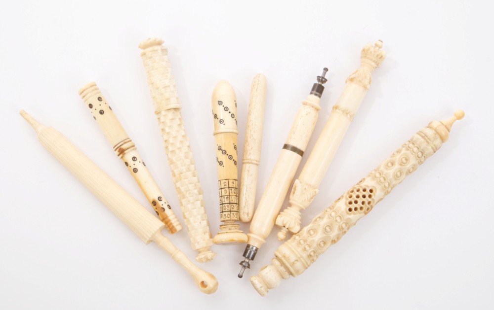 Good collection of eight 19th century carved ivory or bone bodkin cases,