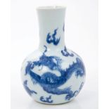 Antique Chinese blue and white bottle vase with painted dragon,