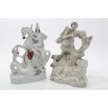 Unusual Victorian Staffordshire figure of a huntsman slaying a lion with a spear,