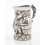 19th century Continental silver miniature Toby jug with ornate scroll handle,