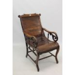 Unusual Chinese hardwood chair with carved yoke form top rail and horizontal slatted seat,