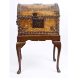 Mid-18th century studded leather trunk of domed form, richly patinated,