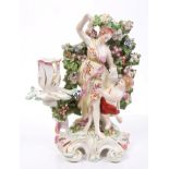 18th century Derby porcelain candlestick with female figure, cherub and bocage,