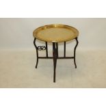 Late 19th century / early 20th century Chinese brass tray table on folding hardwood stand,