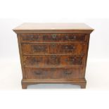Early 18th century and later yew and oak chest of drawers, having four long graduated drawers,