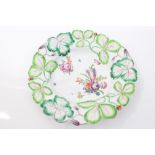 18th century Longton Hall moulded plate finely polychrome painted with flowers within strawberry