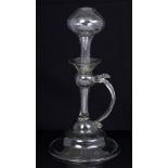 Early / mid-18th century glass lacemakers' oil lamp with loop handle and bell-shaped base,