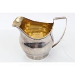 George III silver helmet cream jug with bands of bright cut decoration, engraved crest,