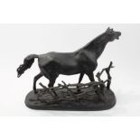 After Mene: Mid-20th century cast iron model of a horse, on naturalistic oval plinth base,