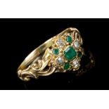Early Victorian emerald and diamond cluster ring with a flower-head cluster in gold setting with