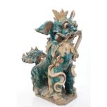 Antique Chinese glazed pottery roof ornament in the form of a Dog of Foo,