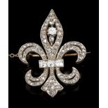 19th century diamond fleur-de-lys brooch with old cut and rose cut diamonds in silver setting,