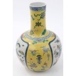 20th century Chinese export porcelain bottle vase with polychrome precious object and floral