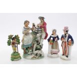 Early 19th century pearlware figure of romantic couple with bird cage, lamb and duck by waterfall,