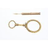 19th century gilt metal magnifying glass and gold (9ct) toothpick