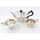 Early George V silver three piece bachelors tea set - comprising teapot of cauldron form,
