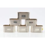 Set of six contemporary silver napkin rings of billet form,