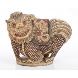 Fine Chinese Qing period carved bone scholar's seal in the form of a temple lion with saddle on