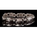 Contemporary diamond bracelet - comprising seven panels with baguette cut diamonds in channel