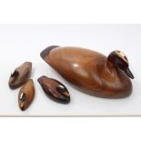 Finely worked carved hardwood ducks utilising various hardwoods, comprising large duck,