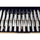 Fine quality Edwardian set of twelve pairs of dessert knives and forks, by Allan & Darwin,