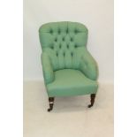 Late 19th century nursing chair by Howard & Sons with turned front legs,