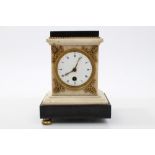 Early 19th century French mantel clock with white enamel dial with gilt hands and Roman numerals,