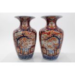 Pair late 19th century Japanese Imari vases of fluted baluster form, with floral decoration,