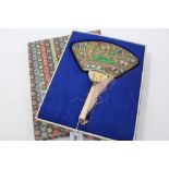 Fine 1930s Chinese enamel and gilt metal mirror of fan-shaped form, the back decorated with fish,