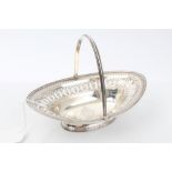 George III silver swing-handled sweetmeat basket of navette form,