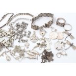 Group of silver and white metal jewellery including bracelets, chains,