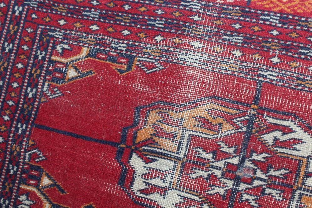 Kelim rug with geometric design against a blood-red field, 200cm x 102cm, - Image 3 of 5