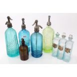 Collection of antique glass soda syphons,
