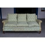 Good late 19th century Howard & Son sofa with original lime-green ticking,