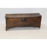 17th century elm six-plank coffer, the interior with candle box on V-cut end supports,