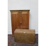 19th century pine dome-top trunk with flanking carrying handles, 68cm wide,