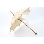 Late 19th / early 20th century horn-handled parasol with gilt mounts and silk canopy