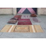 Three Tekke-style rugs,